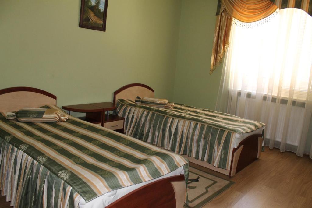 Passage Hotel Beregszász Szoba fotó